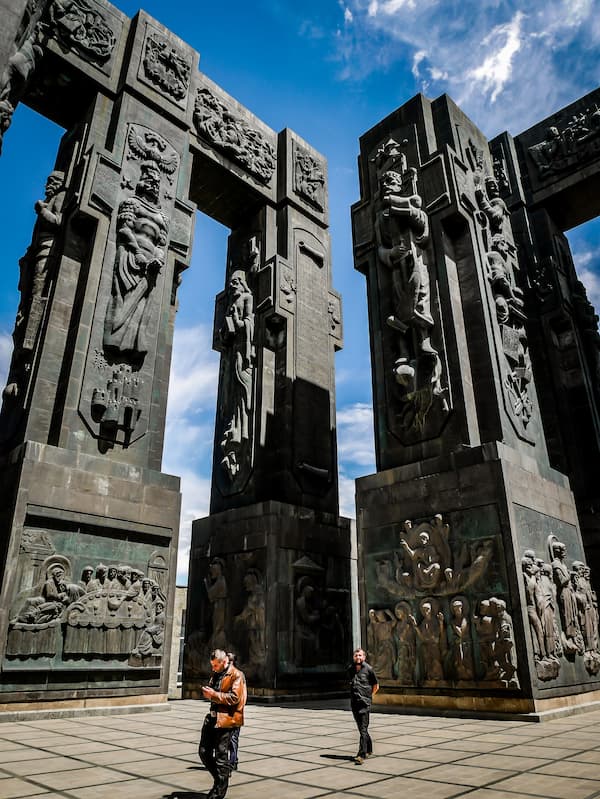 The massive historical pillars of the Chronicles of Georgia monument